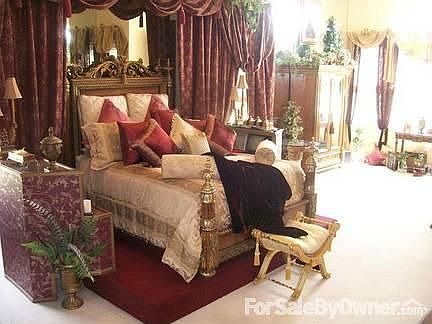 Master Bedroom : Large Bedroom and Sitting Area with Tall Ceiling overlooks lake.