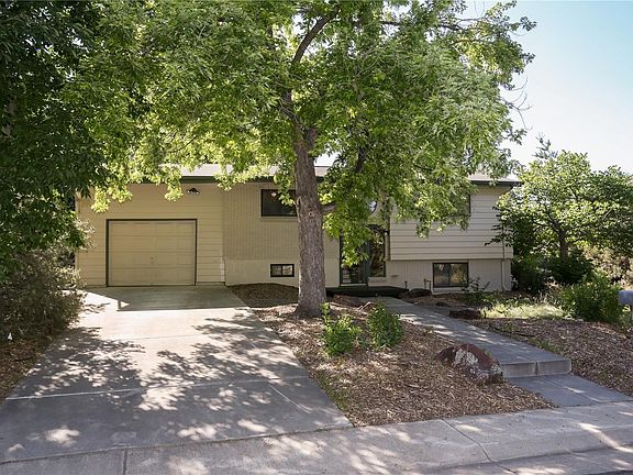 The yard is professionally designed by a landscape architect to be xeriscaped for low maintenance and low water.