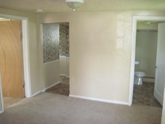 Bathroom on right, kitchen on left
