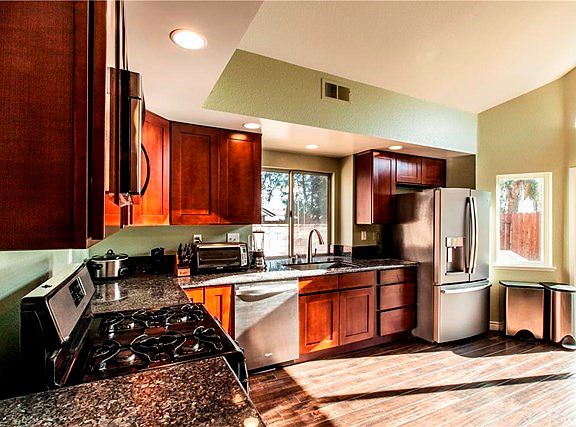 Granite countertops, garden window over the sink