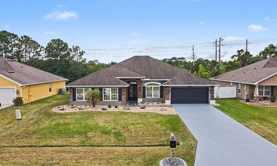 1st image of 5867 NW Leah Drive