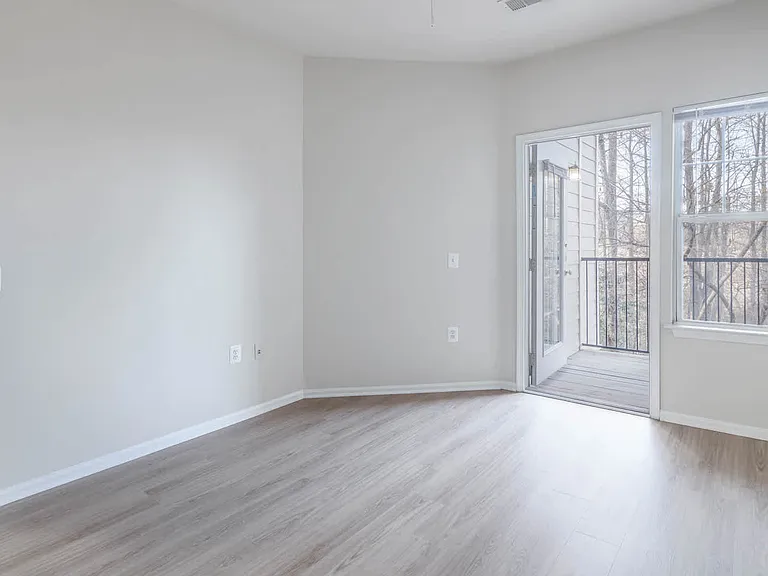 Bedroom with Balcony and Hard Surface Flooring