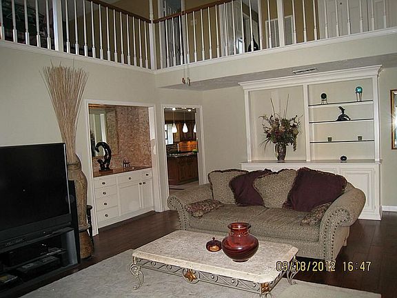 Family room rear view looking over to kitchen