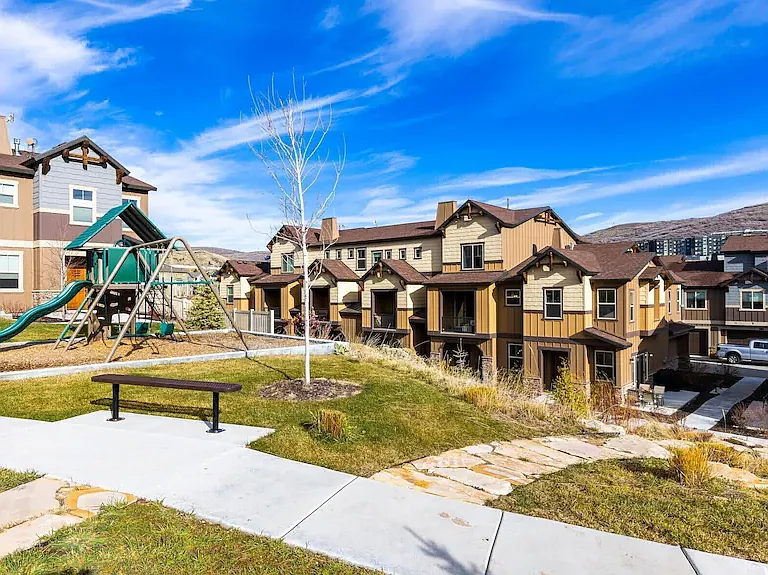 View from outside unit, conveniently located near playground, and outside eating area.