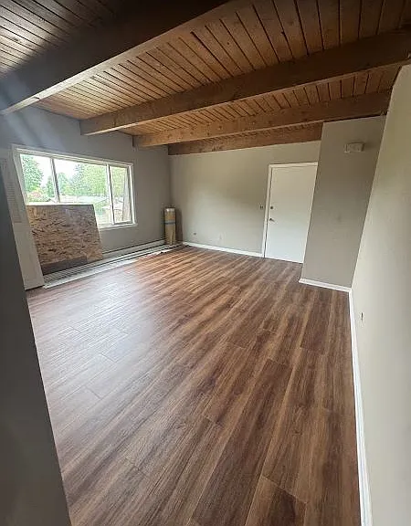 Large living room (supplies from flooring will be removed)