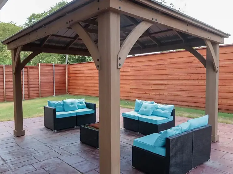 Huge backyard with a Gazebo and 8 foot Fence
