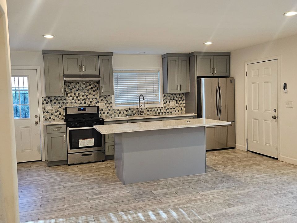 Open Kitchen & Living Area - Two Exits