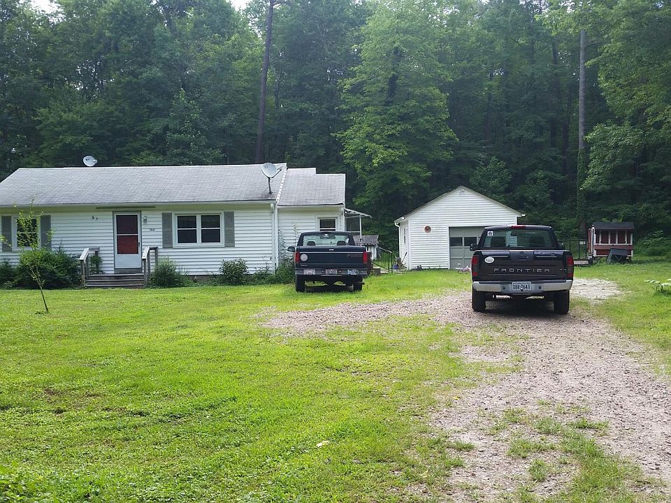 FRONT OF HOME. CRUSHED BRICK D/W PAVEMENT. PLENTY OF PARKIN