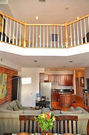 View from the dining space to the loft with High Ceilings ( please note picture taken before kitchen renovation)