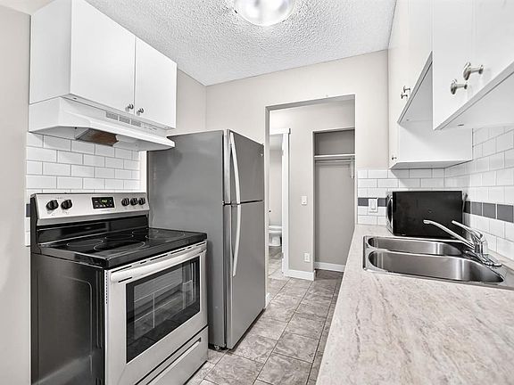 5th image of 11415 E 8th St SW #1