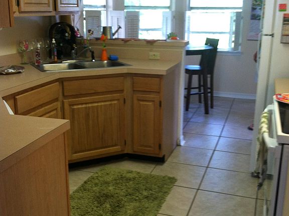 Kitchen stainless steel appliances (not shown)