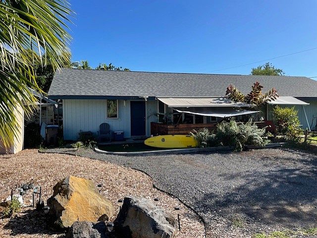front yard with garden to the left