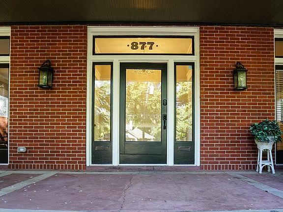 Front door entry leads to private door access
