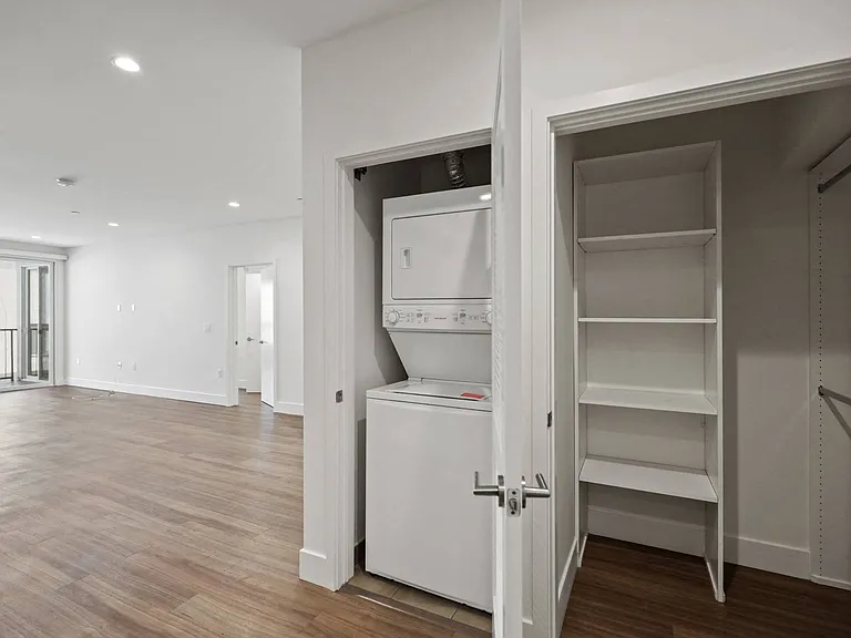 In-Suite Washer & Dryer and Hall Closet with Shelving