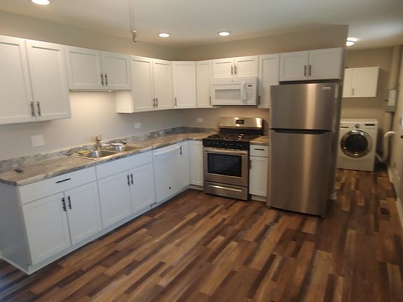 Kitchen-Recessed LED Lighting, Rangetop Microwave and Dish Washer