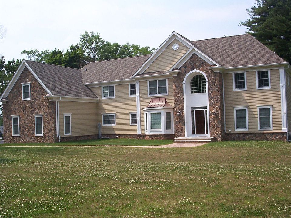 Front elevation with Hardie Plank and cultured stone veneer