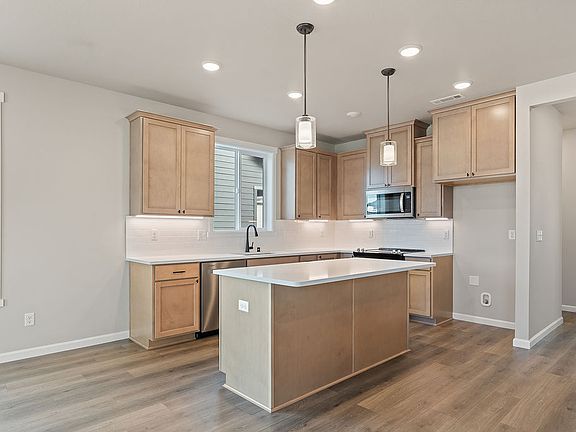 7110 S Holly ST by Aho Construction