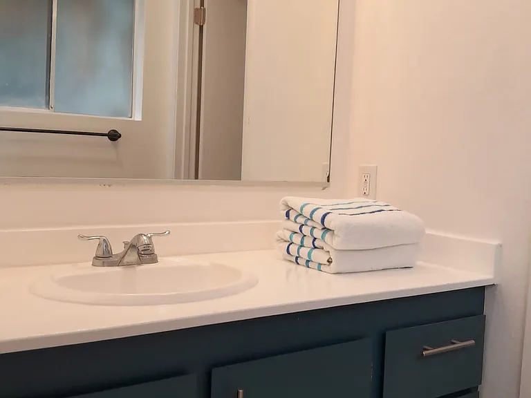 Master en-suite bathroom sink (has separate toilet and shower room)