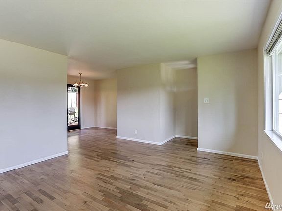 Living room opens to the eat-in kitchen.