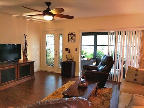 Living area with Sliding doors that open onto the enclosed Lanai