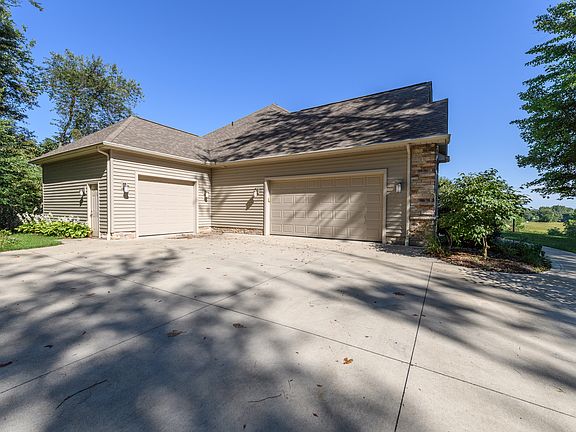 Separate garages fit 3 cars