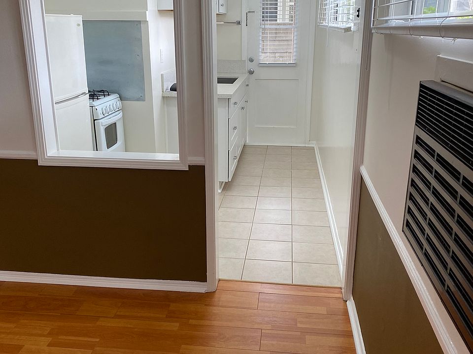Living area looking into kitchen