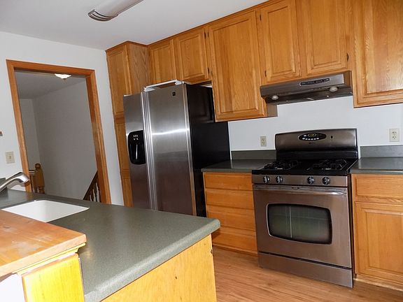 Oak Cabinets and all Stainless Steel Appliances.