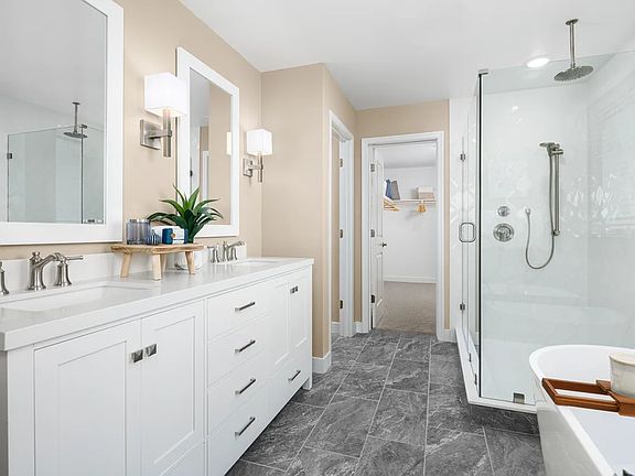 Primary bath with glass shower enclosure