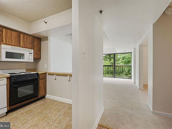 2nd image of 2921 N Leisure World Blvd #1408