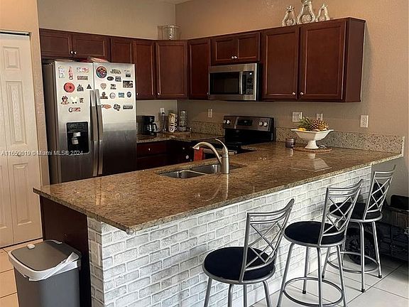 2nd image of 9309 W 32nd Ln #9309
