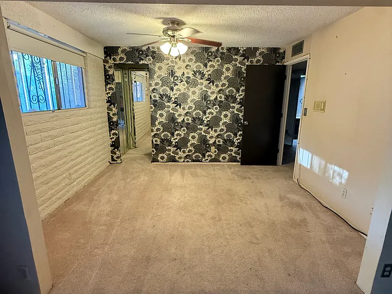 This space could be used as an office, den, or 4th bedroom if renter were to purchase/install a temp room divider were used_it is adjacent to the living room area.
