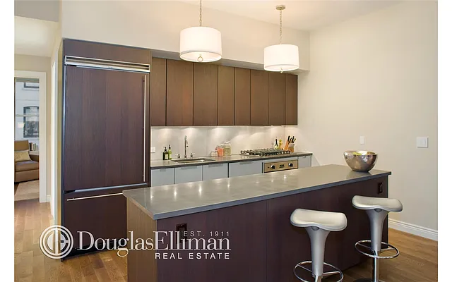 Sold by Douglas Elliman | media 18