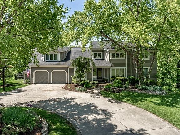 Gorgeous contemporary 6 bedroom home with in ground pool, gourmet kitchen and more.
