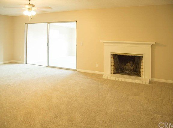 The Living Room with Fireplace.