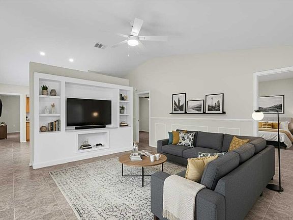 Large living room with entertainment center