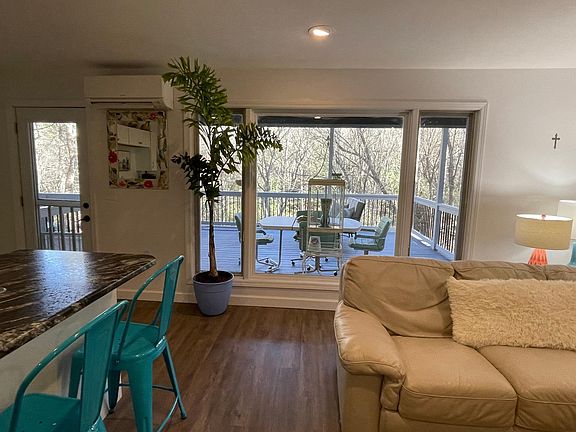 Inside the apartment looking out to the apartment porch
