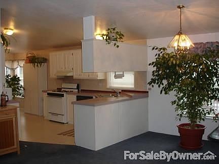 Spacious kitchen
						:
						Counter space all around; gas range and breakfast nook.