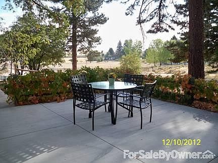 Back Yard View
						:
						The back patio has a view that overlooks Honey Lake and you can see for 70 Miles