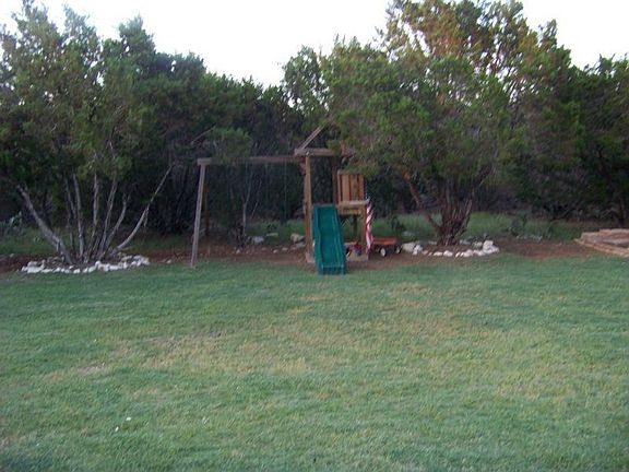 back yard with playscape
