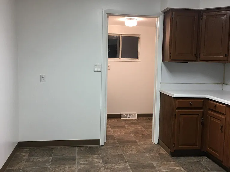 Kitchen and connection to laundry room
