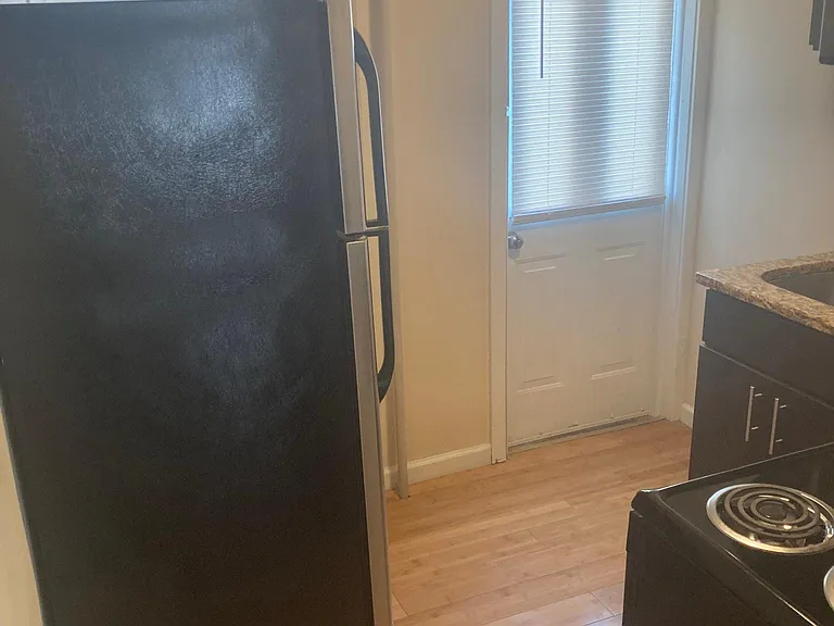 Kitchen with granite counters and stainless steel appliances