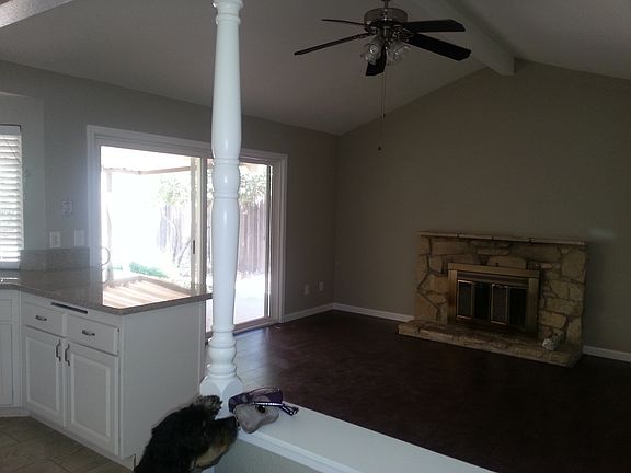 family room with wood burning fireplace
