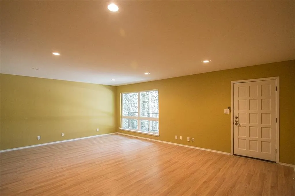 Large Living room with recessed lighting