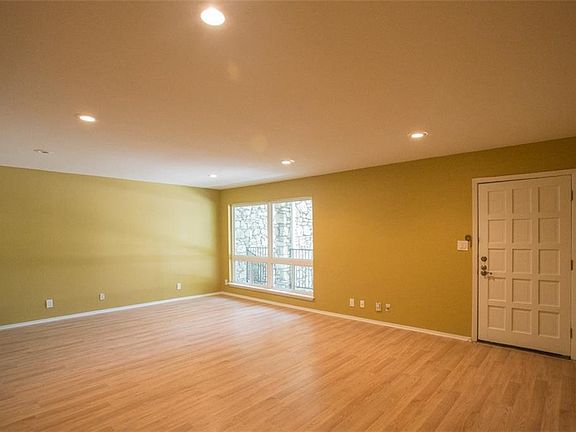 Large Living room with recessed lighting