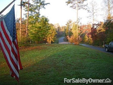 Dusk view of the house.
						:
						No neighbors, lots of woods. 2400 square feet country home.