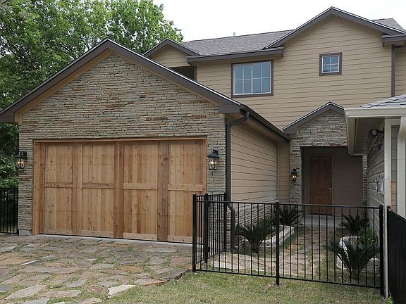 Exterior w/ Wood Garage Door