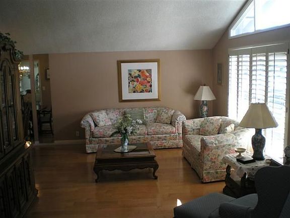 Dramatic vaulted ceilings living room.Maple floors
