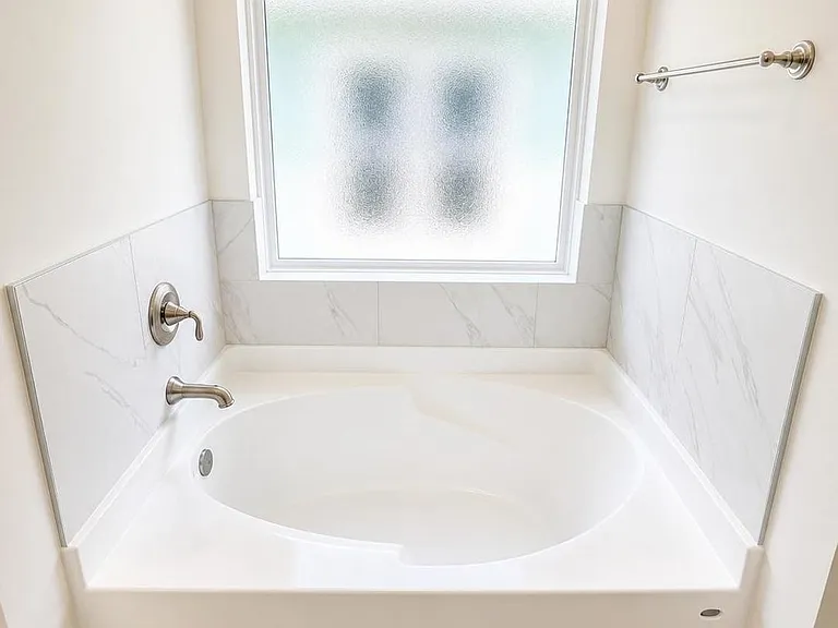 Master bathroom also features a relaxing soaking tub