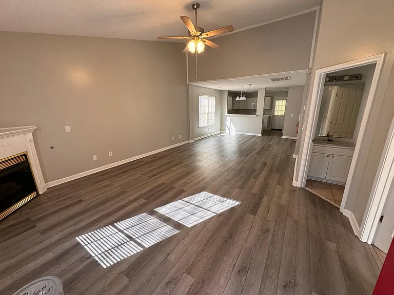 LVP Flooring in Living/Dining Room, Repose Grey Satin Painted Walls throughout