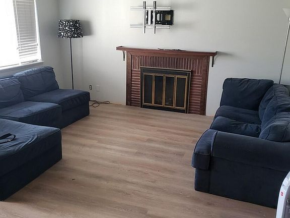family room, new vinyl flooring, new interior paint